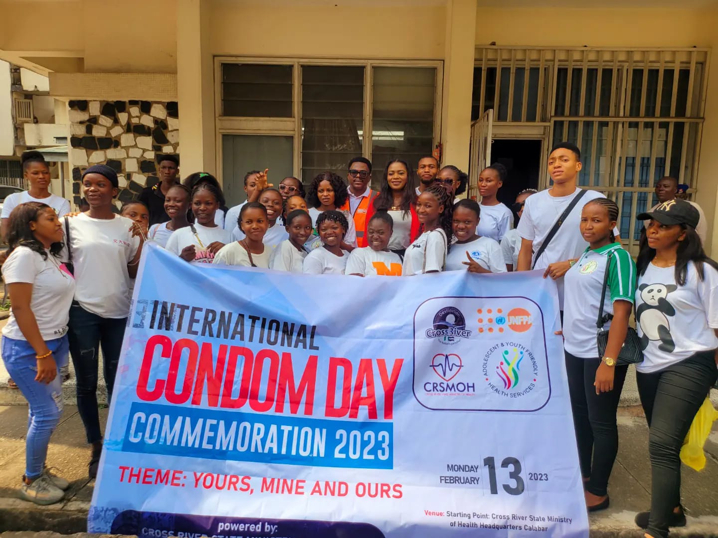 Young people in a group photo with the Cross River State Commissioner for Health during the 2023 International Condom Day, in Calabar
