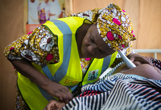 A survivor at an IDP camp in Maiduguri, receiving ante-natal care at a UNFPA health facility 